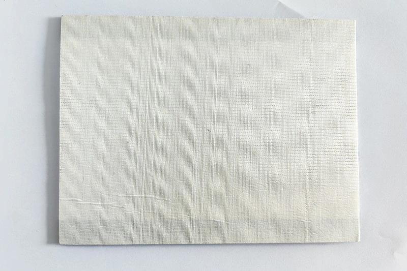 Thin rectangular white fiber sheet
